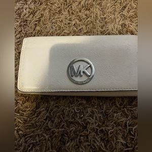 - Michael Kors wallet